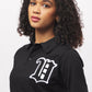 Women's - House of V - Black Varsity Chenille Patch Polo-Vaughn de Heart